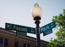 Street signs showing intersection of Mt. Pleasant St and Park Rd., NW.