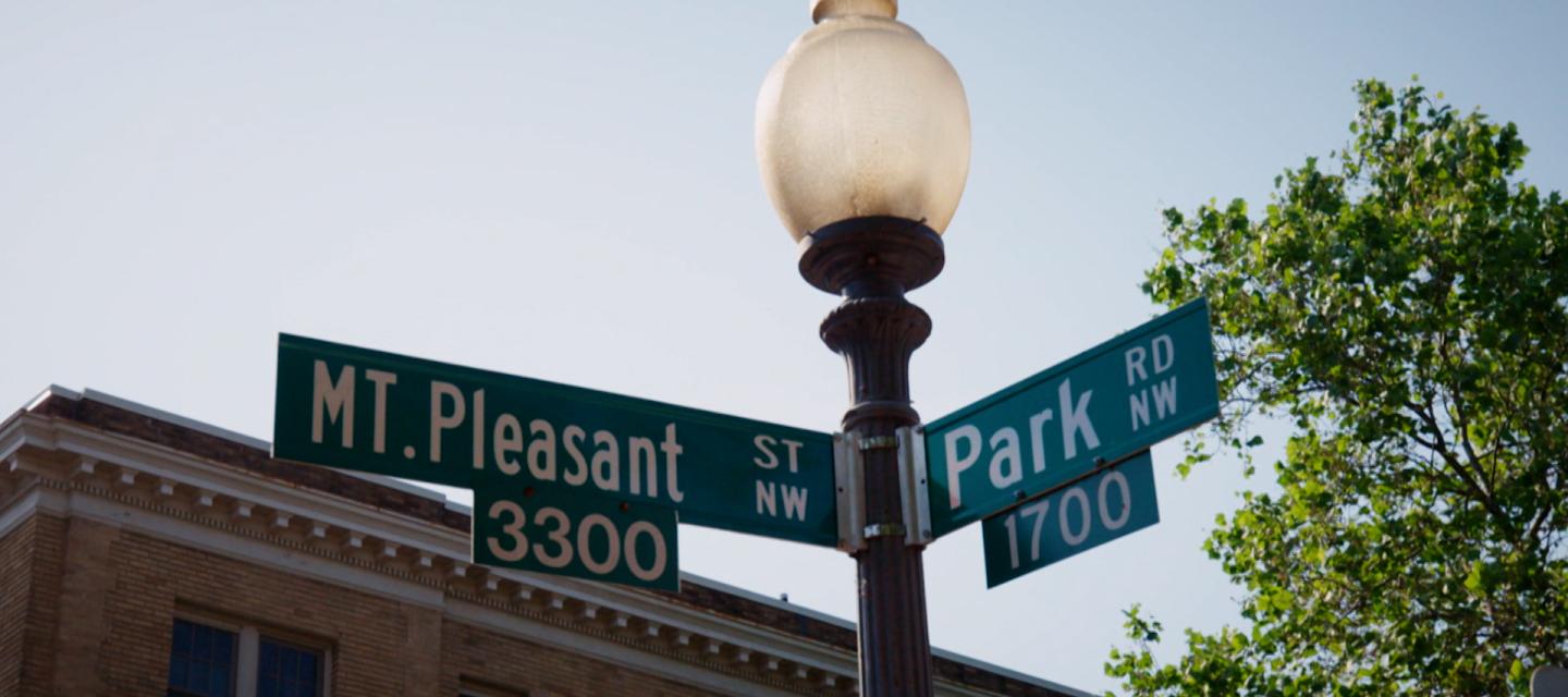 Street signs showing intersection of Mt. Pleasant St and Park Rd., NW.