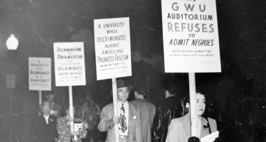 People protesting outside Lisner Auditorium during Joan of Lorraine’s three week run in 1946.