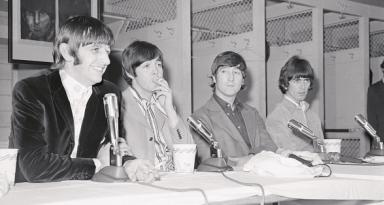 The Beatles hold a press conference in the Washington Senators' locker room at D.C. Stadium, August 15 1966. (Source: Bettmann/Getty Images)