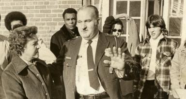Lt. O.W. Larsen talks with his wife shortly after his release. (Photo Credit: Ken Heinen, Reprinted with permission of the DC Public Library, Star Collection, © Washington Post.)
