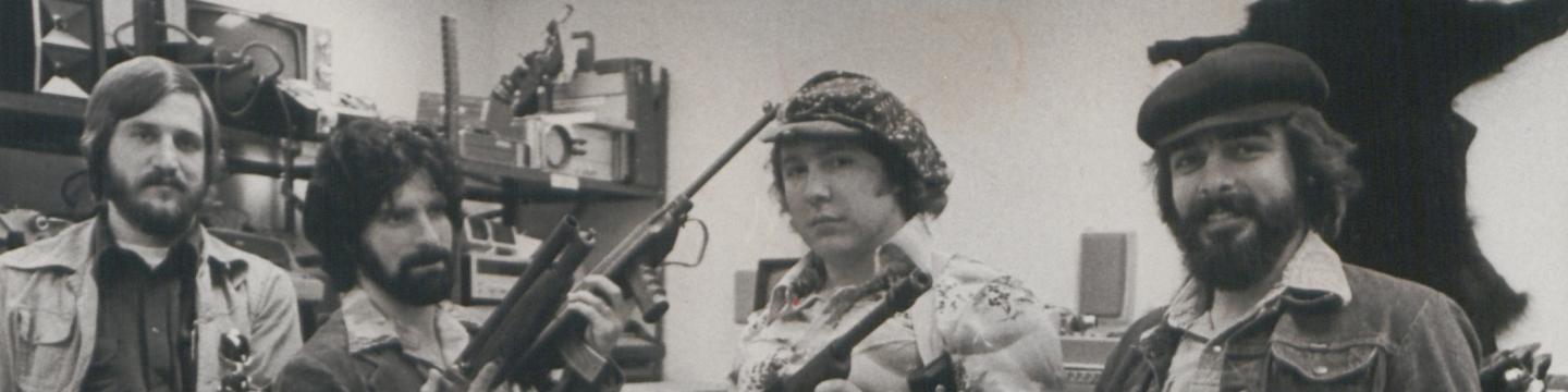 Lt. Robert Arscott and the Operation Sting team sit amid stolen goods